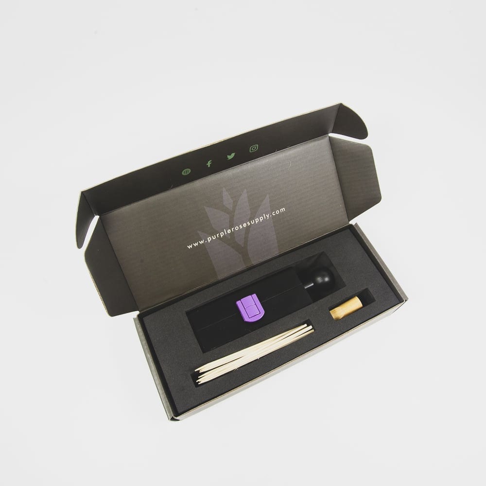 Blunt rolling kit displayed in box set with personal CannaMold, bamboo skewers, and wood tips for joints.