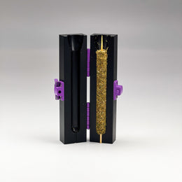 A cannabis cigar inside it’s cannamold kit after being packed for a slow burning blunt.